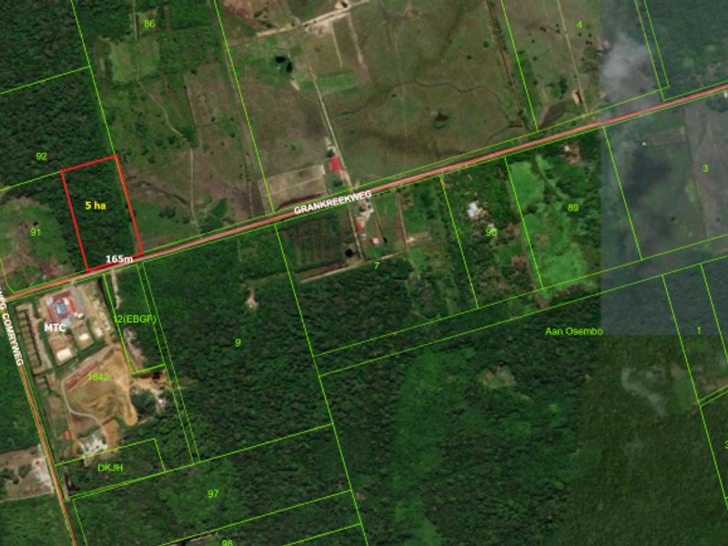 Eigendom Wayamboweg 14ha. Iets voorbij 5e rijweg aan de rechterzijde van de weg met een woning. Landbouw terrein